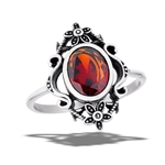 Stainless Steel Antiqued Oval Ring With Red Garnet CZ And Flower Accents